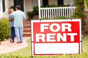 Senior Hispanic couple renting new home