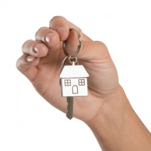 Hand Holding House Key